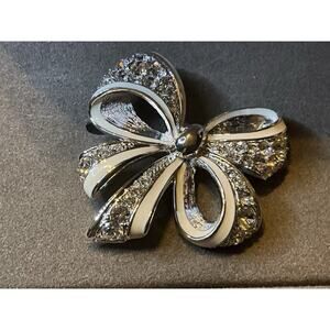 Nolan Miller Silver Tone with White Enamel Bow Brooch